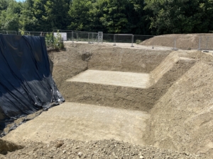 Grube für Entwässerungsschächte und Bohrkeller-Verschalungen